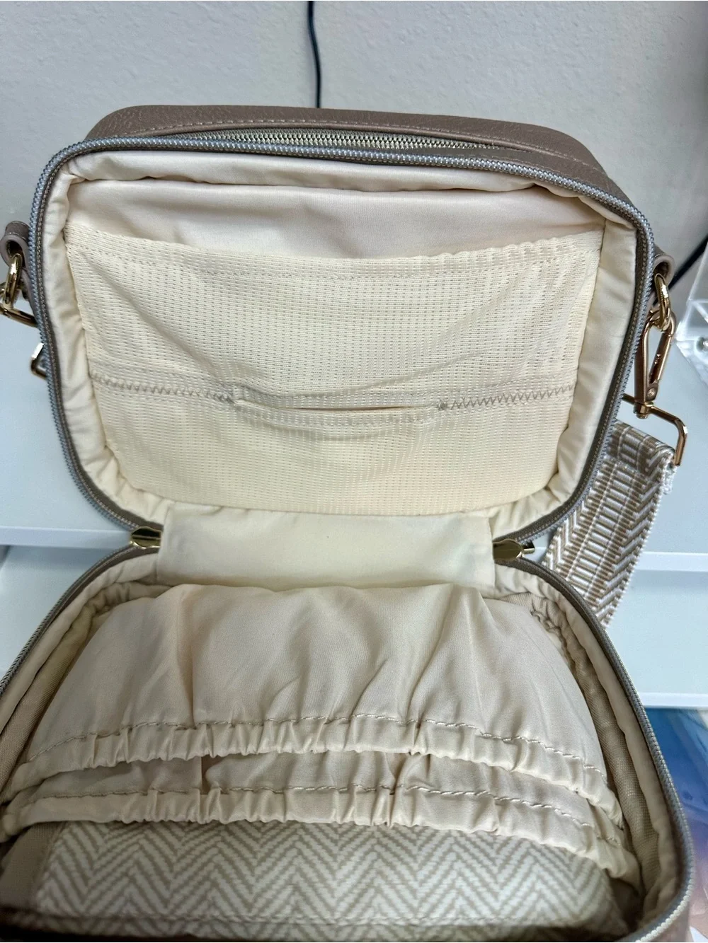 Itzy Ritzy Quilted Crossbody Bag in Taupe with Woven Strap